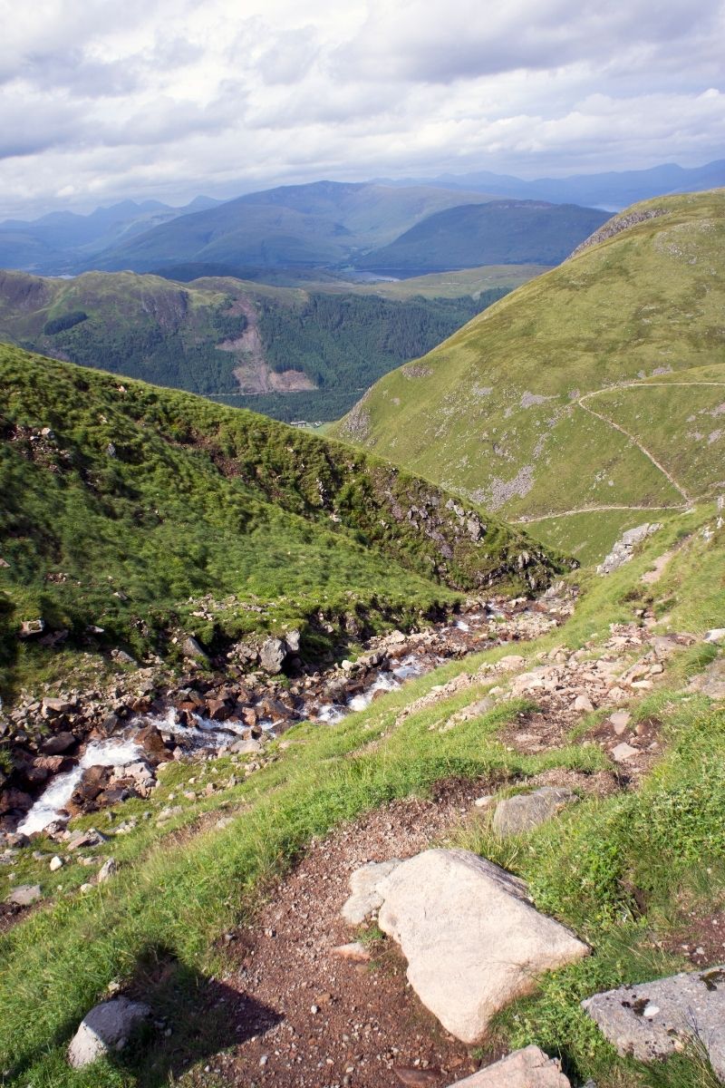 The best walks in Scotland, from breathtaking mountain hikes to scenic lochside strolls. Explore iconic trails, hidden gems, and must-visit routes for every level of adventurer! The Quiraing, Isle Of Skye, Ben Nevis Mountain Path, Loch An Eilein, Cairngorms National Park, Arthur’s Seat, Edinburgh, Old Man Of Storr, West Highland Way, Loch Ness 360 Trail, Cairn Gorm Circular, Loch Lomond And Conic Hill, Falls Of Glomach, Hermitage Walk, Glencoe Lochan Trail, Fairy Pools, Nature Walks Scotland