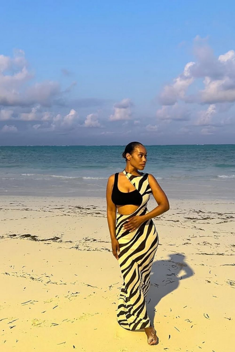 Planning a trip to Tanzania? Discover stylish and practical outfit ideas for every occasion—from safari adventures to beachside brunches. Get inspired with chic looks perfect for exploring Zanzibar, market strolls, and sunset dinners! Zanzibar Outfit Ideas, Zanzibar Outfit Aesthetic, Zanzibar Hijab Outfit, Stone Town Zanzibar Outfit, Outfit Vacanza Zanzibar, Zanzibar Vacation Outfit Ideas, Holiday Outfit Ideas, What To Wear In Zanzibar Outfit, Tanzania Outfit Ideas, Tanzania Holiday Outfit