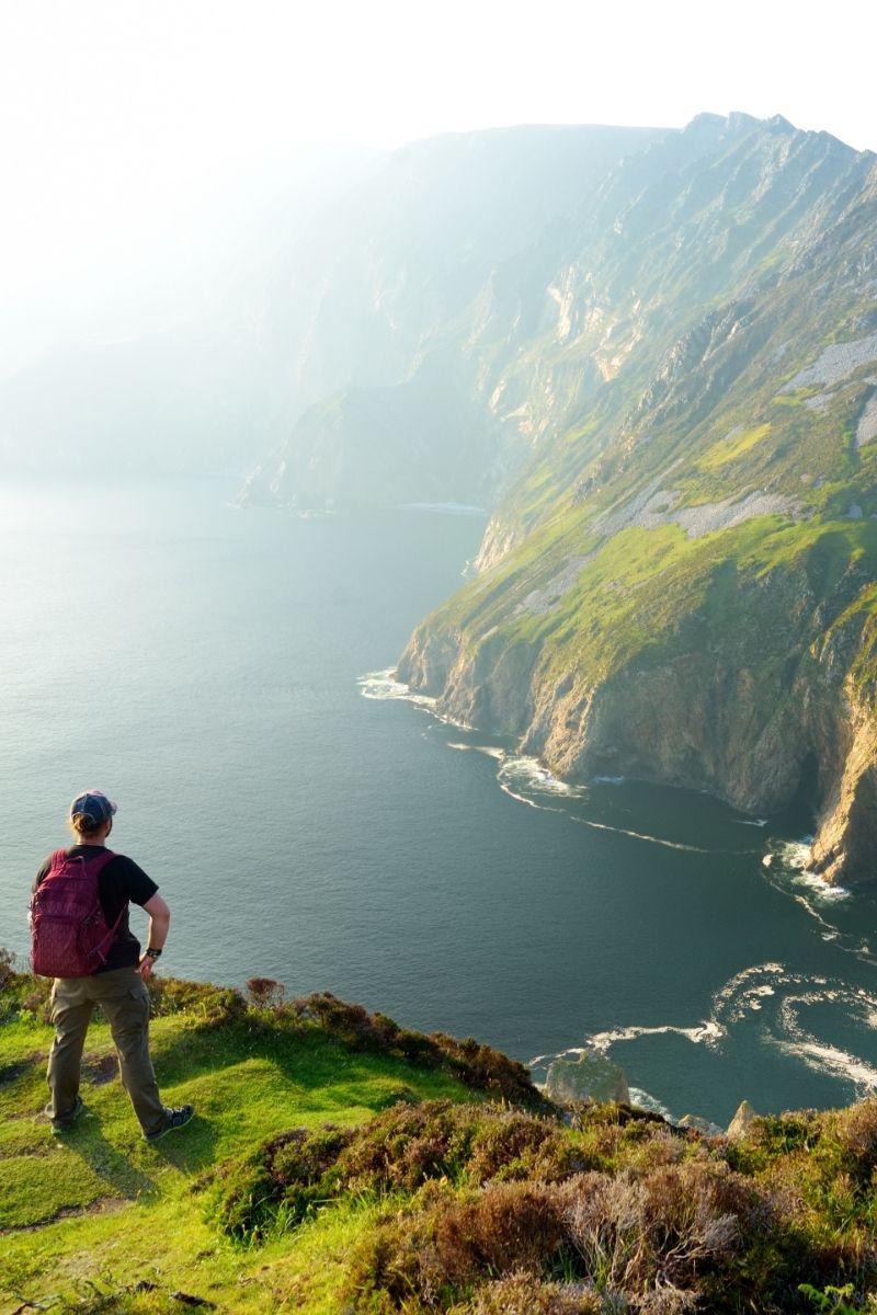 The 15 best walks in Ireland, from breathtaking coastal cliffs to serene mountain trails. Explore stunning landscapes, historic sites and hidden gems perfect for every hiker. Northern Ireland Walks, Nature Walks Ireland, Cliffs Of Moher Coastal Walk, Wicklow Way, Giants Causeway Cliff Walk, Croagh Patrick Pilgrim Path, Carrauntoohil, Howth Cliff Walk, Burren Way, Glendalough Spinc Walk, Slieve League Cliffs Walk, Aran Islands Loop Walk, Gap Of Dunloe Walk, Easy Walks In Ireland, Hiking Ireland