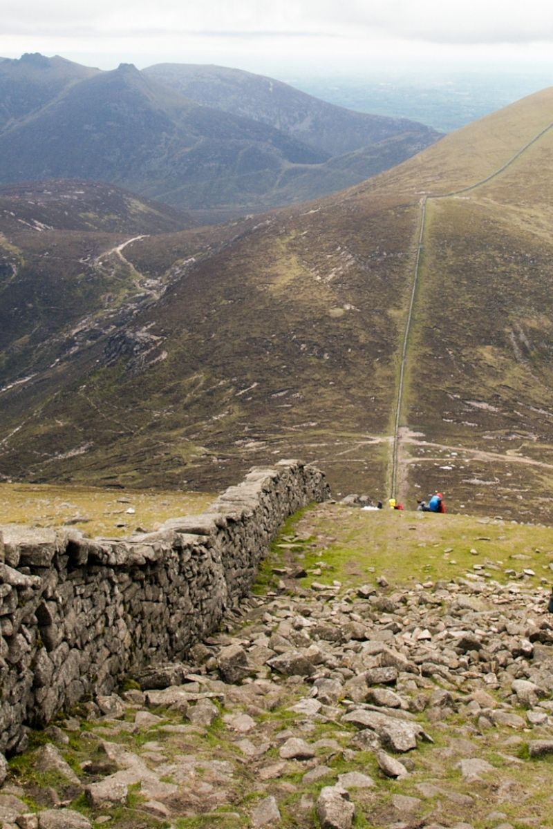 The 15 best walks in Ireland, from breathtaking coastal cliffs to serene mountain trails. Explore stunning landscapes, historic sites and hidden gems perfect for every hiker. Northern Ireland Walks, Nature Walks Ireland, Cliffs Of Moher Coastal Walk, Wicklow Way, Giants Causeway Cliff Walk, Croagh Patrick Pilgrim Path, Carrauntoohil, Howth Cliff Walk, Burren Way, Glendalough Spinc Walk, Slieve League Cliffs Walk, Aran Islands Loop Walk, Gap Of Dunloe Walk, Easy Walks In Ireland, Hiking Ireland